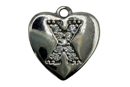 Polished silver-tone heart with a pavé crystal letter X in the center