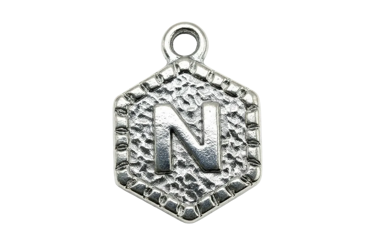 Antique-silver hexagon pendant with raised letter N and textured border