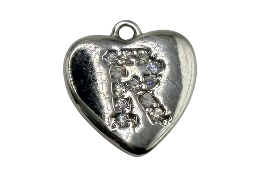 Polished silver heart with raised pavé letter R and clear crystal accents