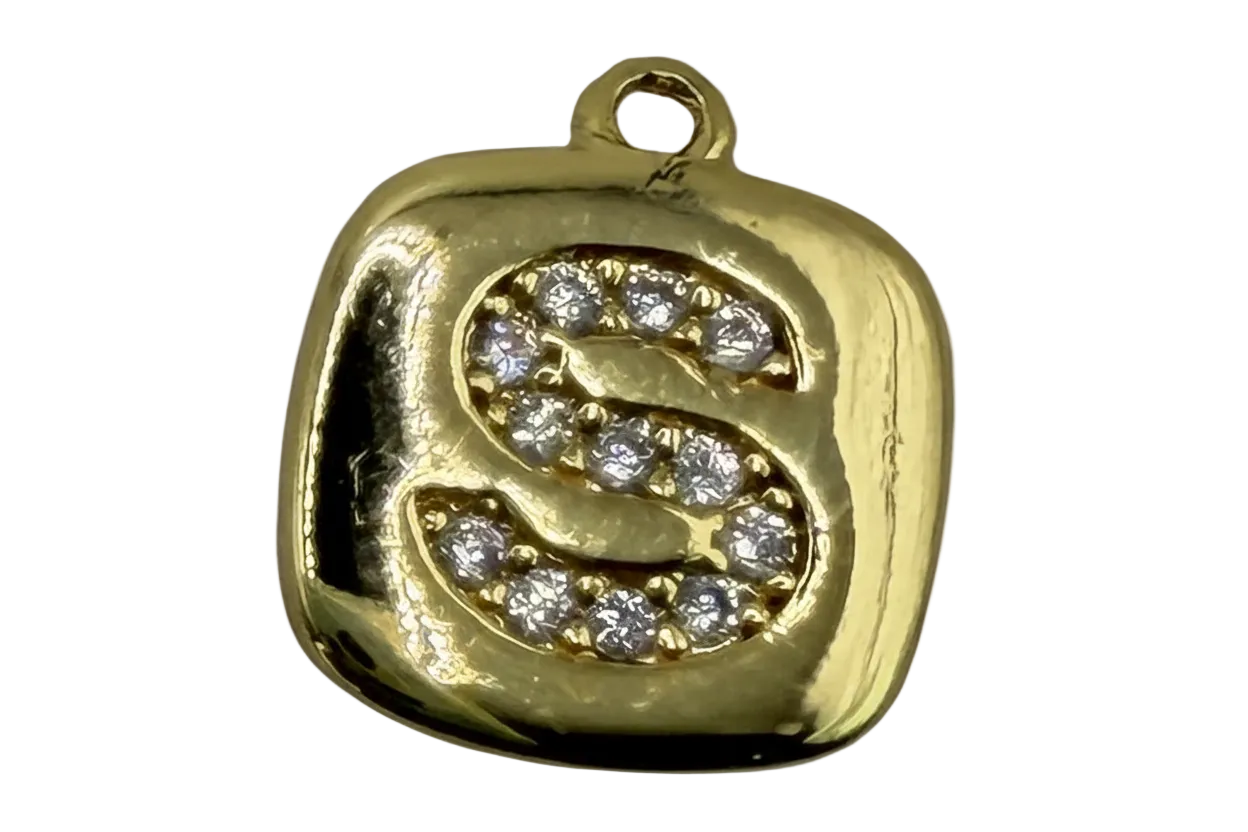 Gold rounded-square tile with pavé S initial in clear stones