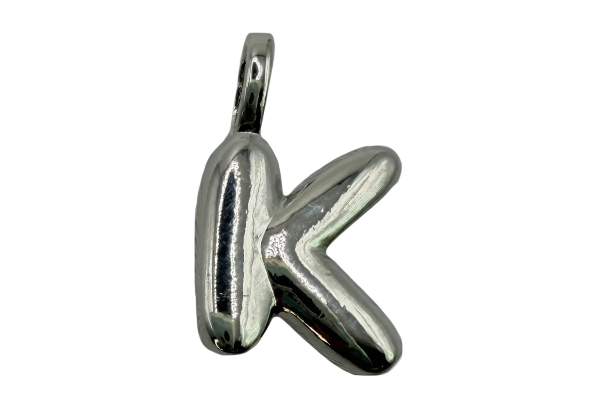 High-polish silver letter K pendant with rounded, reflective finish