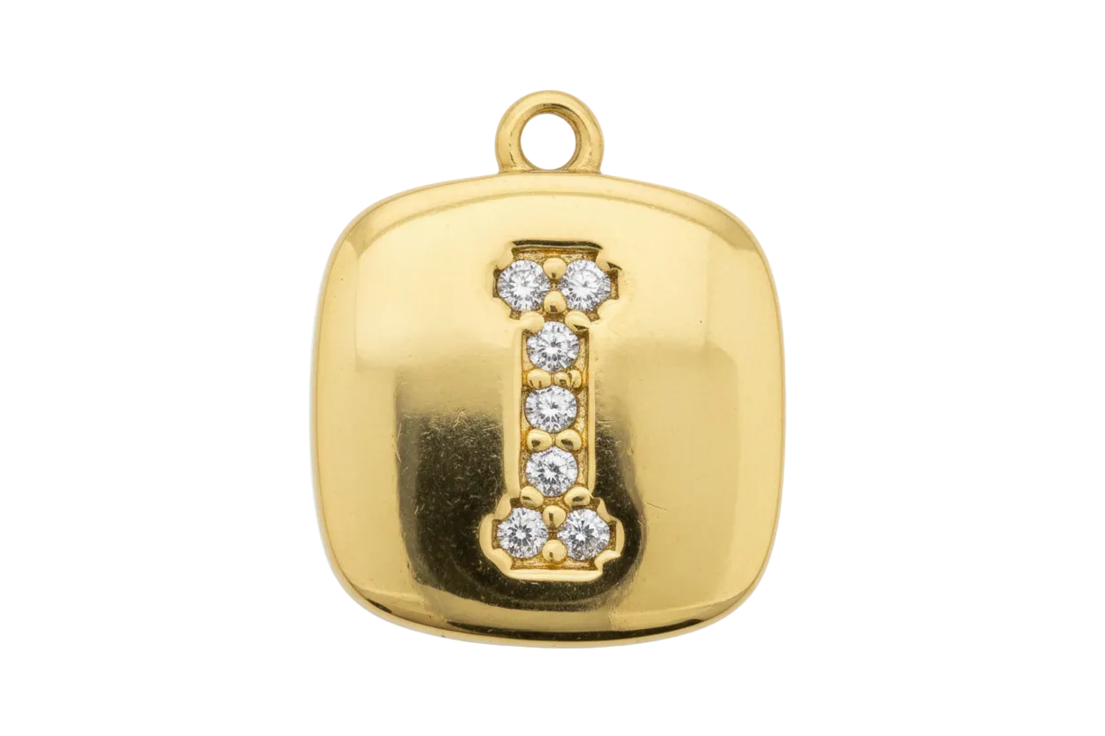 Gold pillow-shaped initial tag with pavé letter I in clear crystals