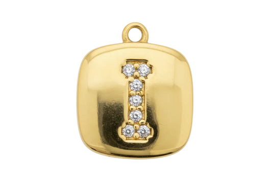Gold pillow-shaped initial tag with pavé letter I in clear crystals