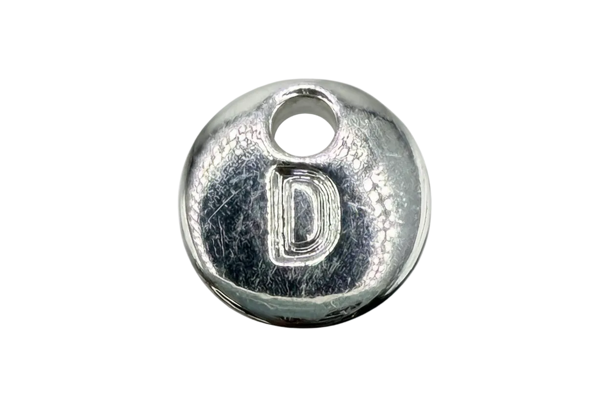Polished silver round disc with raised letter D