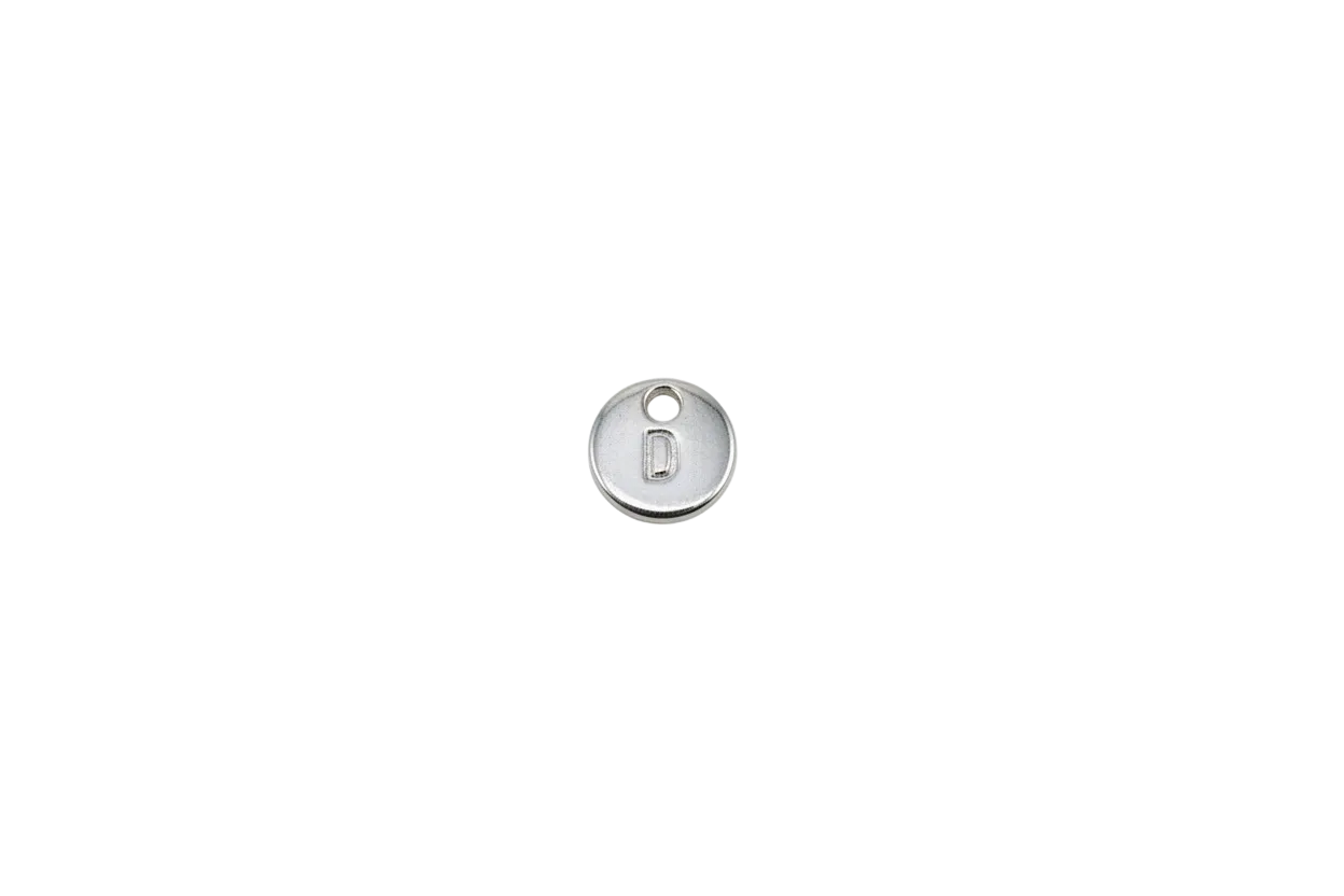 Silver round disc with raised letter D