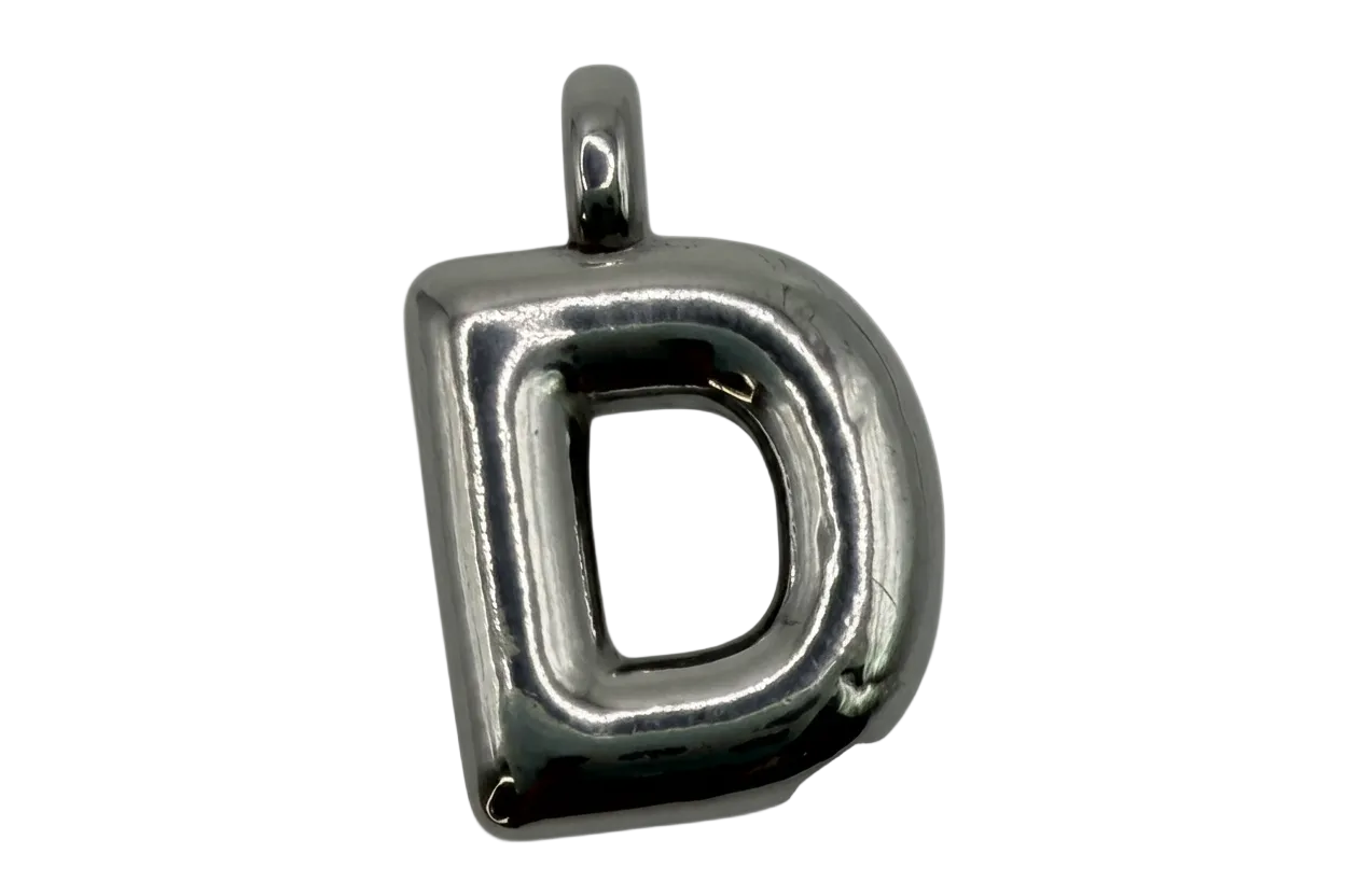 Polished bubble letter D in shiny silver metal with a hollow center
