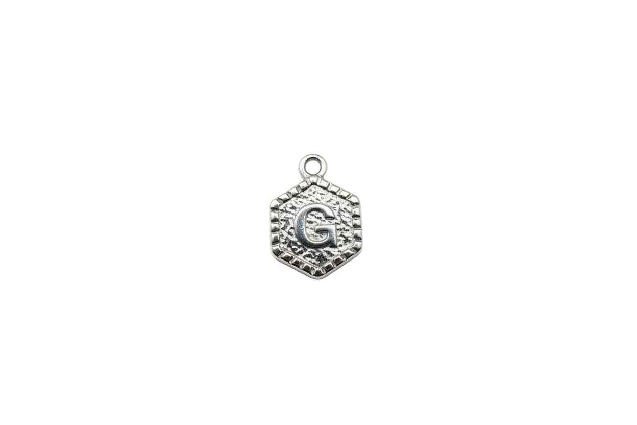 Silver octagon with raised letter G