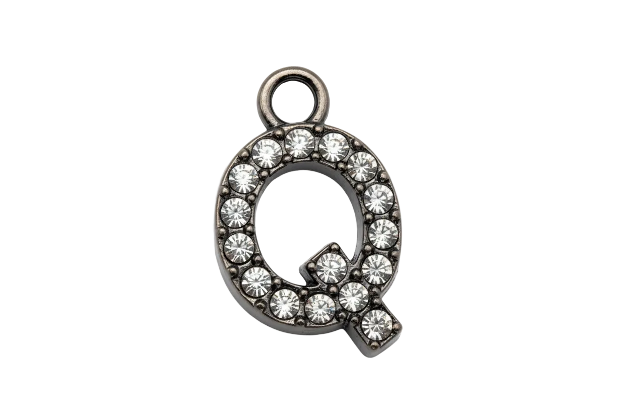 Silver pavé letter Q accented with clear crystals