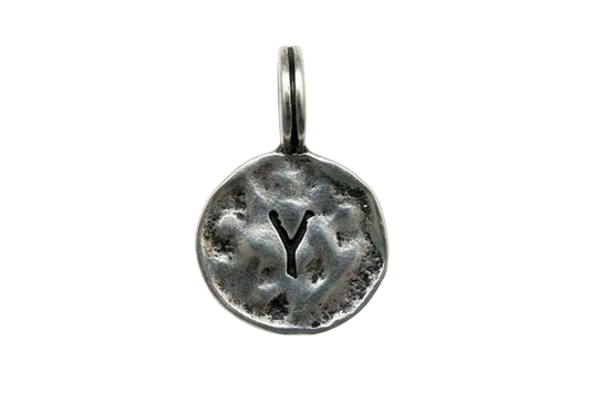 Antiqued silver-toned round disc with cutout letter Y and dark oxidized detailing