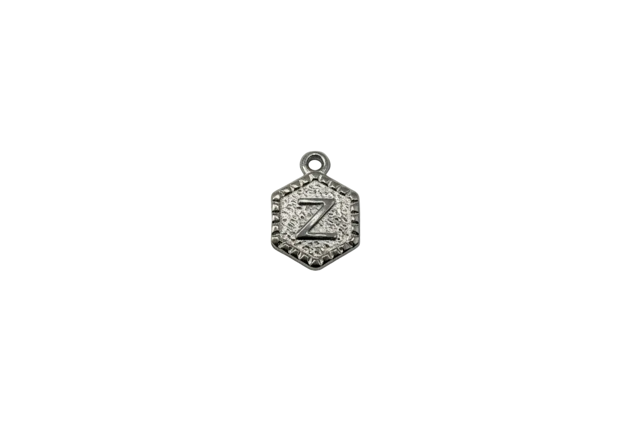 Silver hexagon medallion with raised letter Z