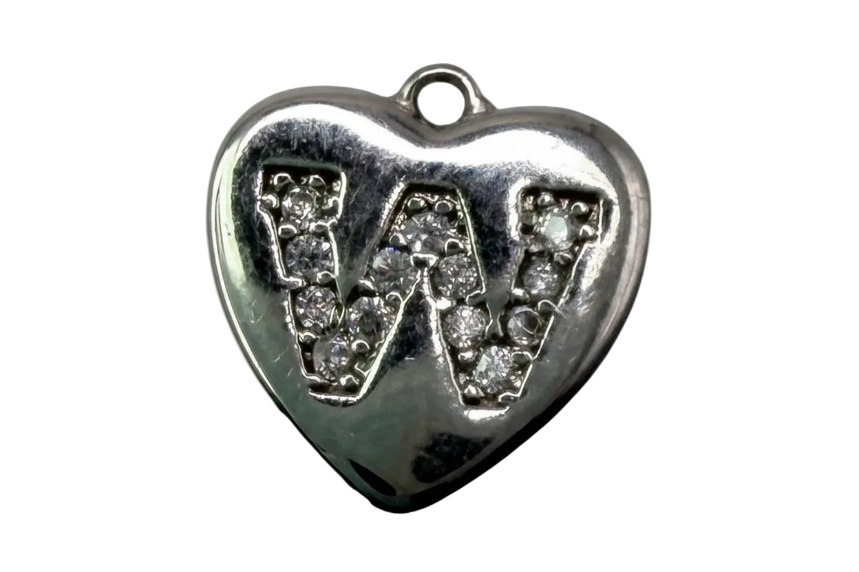 Polished silver heart with clear pavé crystals forming the letters VW