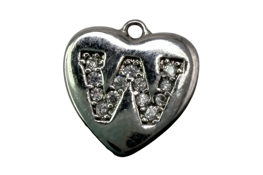 Polished silver heart with clear pavé crystals forming the letters VW