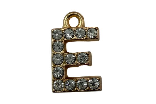 Gold letter E initial with clear faceted crystals in a pavé style