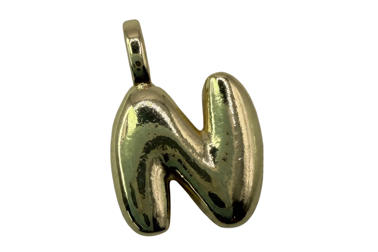 Sculpted high-polish gold banana with smooth rounded contours