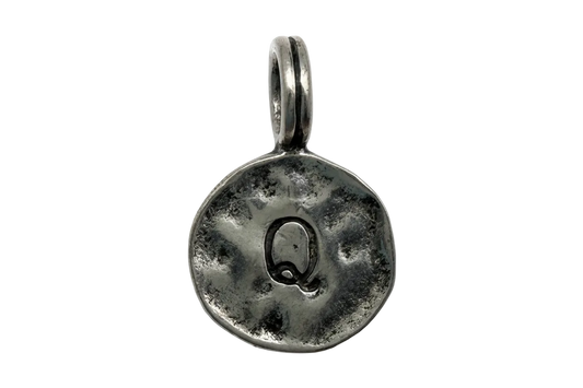 Oxidized silver coin charm with embossed letter Q