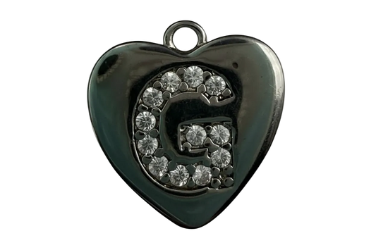 Polished silver heart with pavé letter G in clear crystals