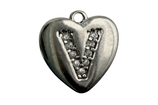 Polished silver heart with pavé letter V inset of clear stones
