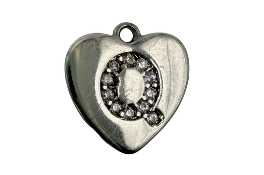 Polished silver-tone puffy heart with pavé letter Q in clear crystals