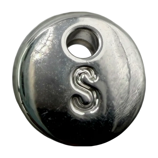 Polished silver round disc with raised letter S