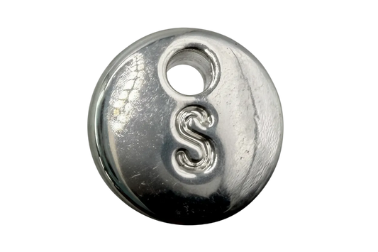 Polished silver round disc with raised letter S and small grey cabochon accent