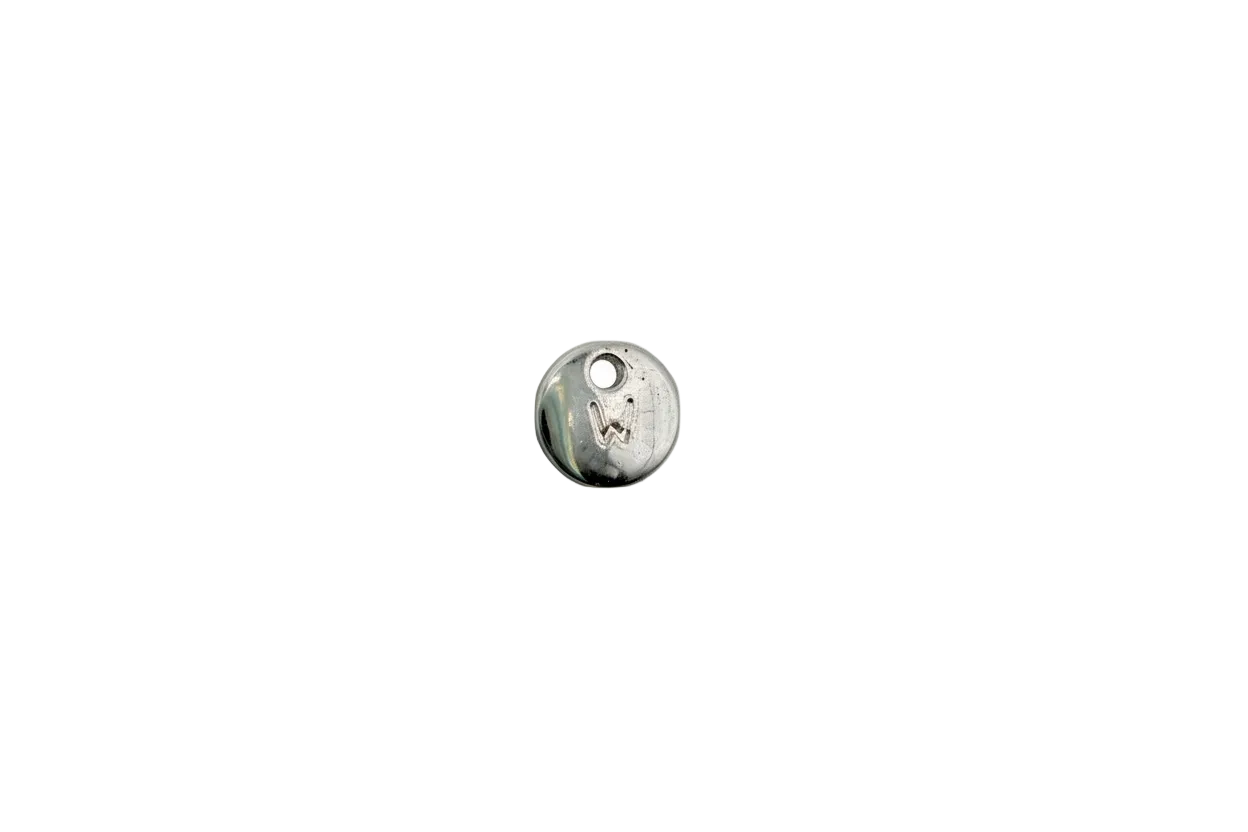 Silver-tone round disc with engraved letter W