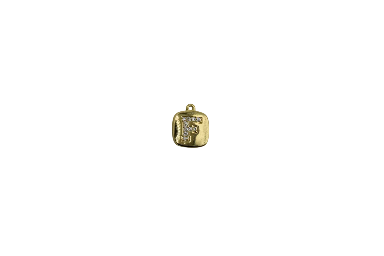 Gold tile with pavé letter F in clear stones