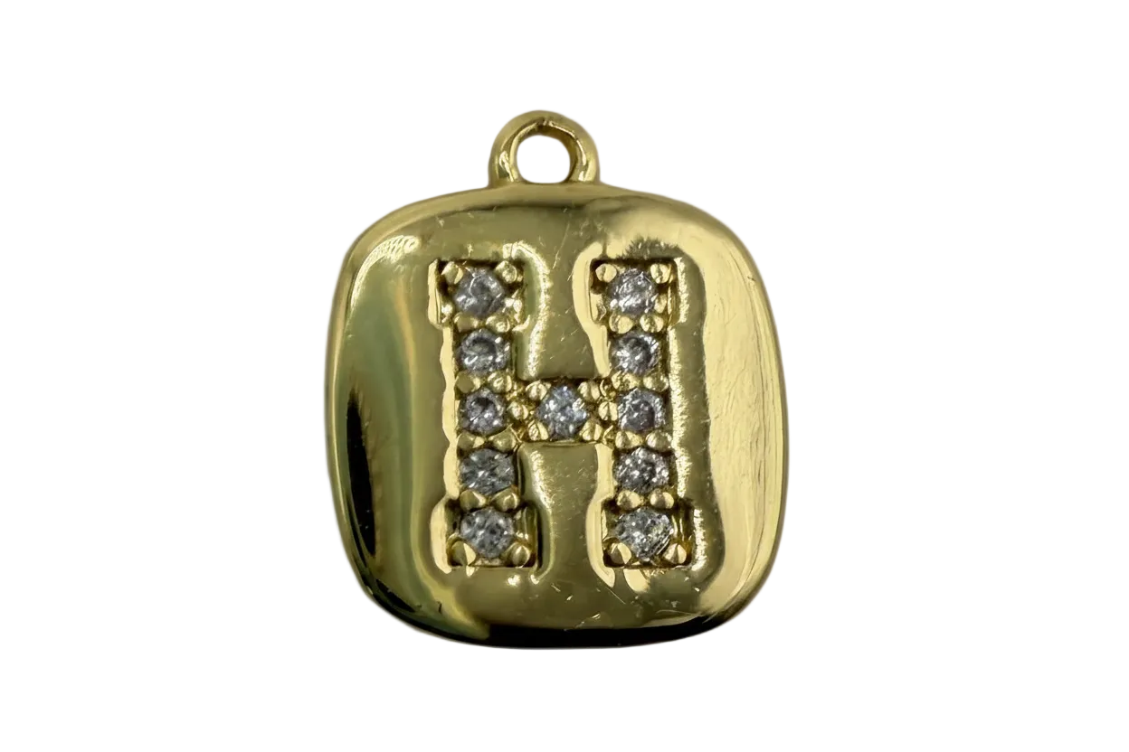 Gold rounded-square tile with pavé letter H in clear crystals