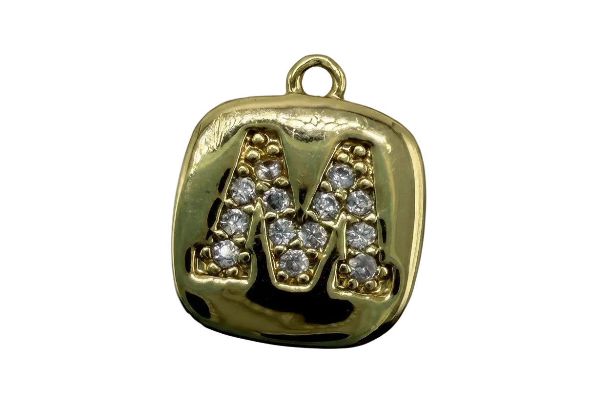 Glossy gold rounded square initial tile with raised pavé letter M set with clear gems