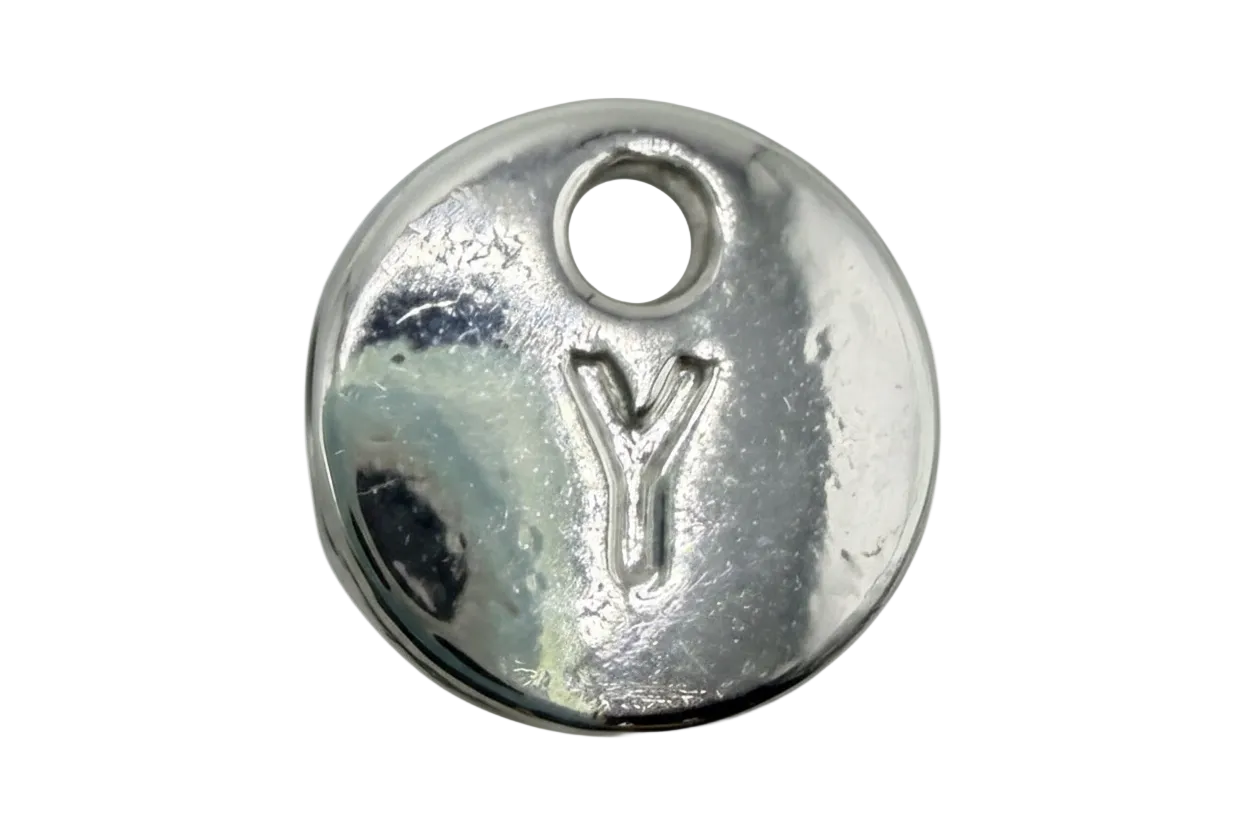 Polished silver-tone round disc with raised letter Y