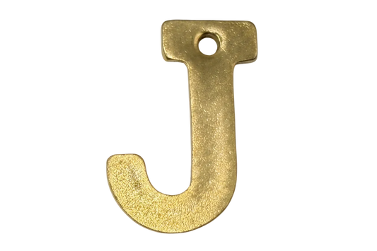 Textured gold letter J with rounded edges and a small top hole