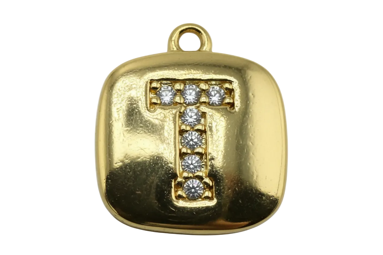 Rounded square gold tag with pavé initial T set with clear gemstones