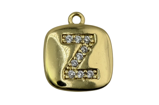 Gold rounded-square tile with pavé letter Z in clear crystals