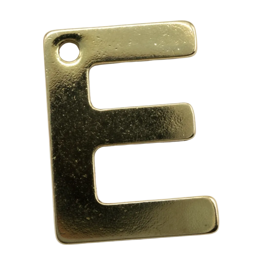 Gold block letter E with a small clear crystal accent on a black background
