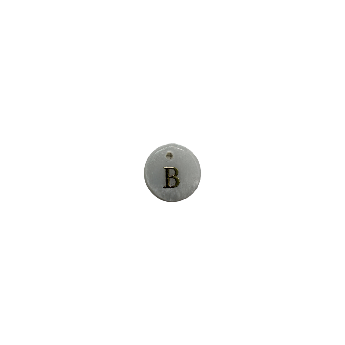 White round disc with gold letter B