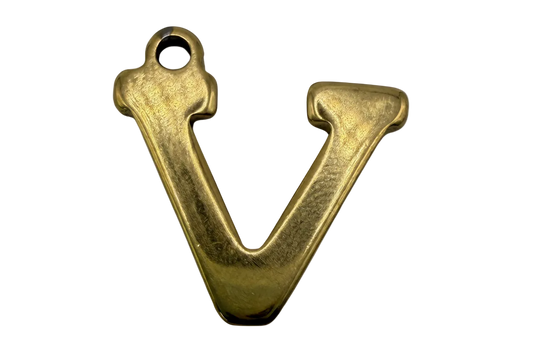 Sculpted gold letter V initial with a softly polished finish