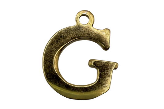 Gold letter G initial pendant with textured finish on black background