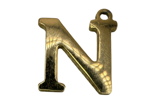 Polished gold initial N letter with smooth, reflective finish