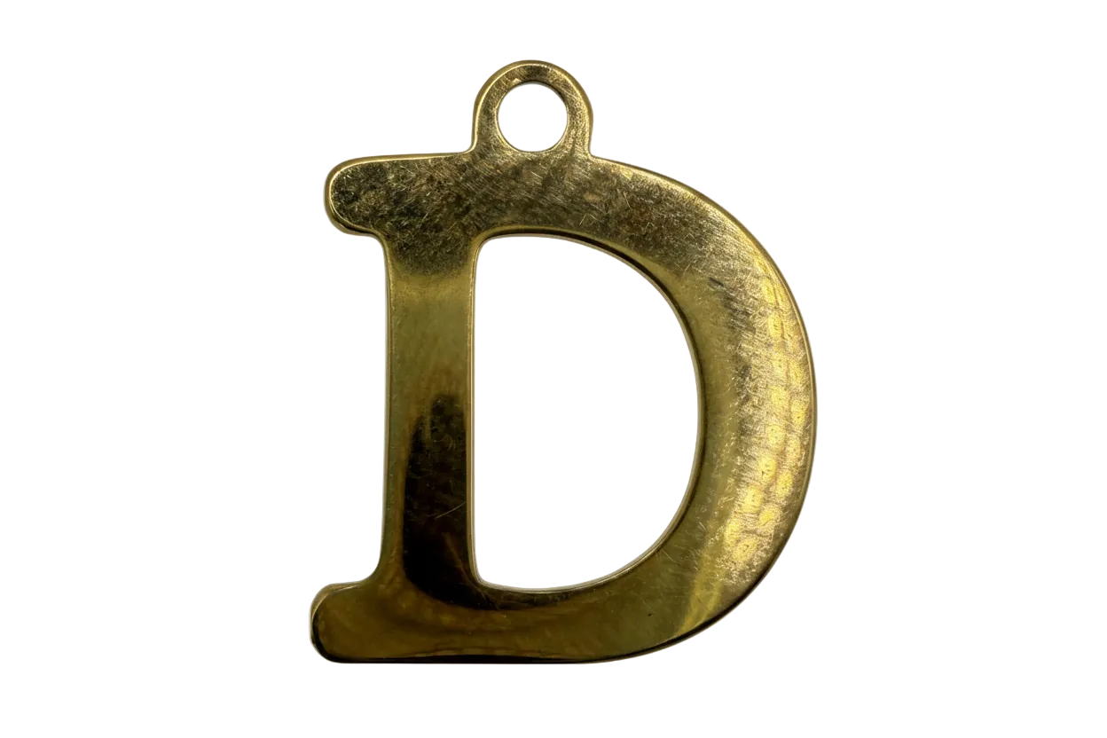 Gold-finish lowercase letter D initial charm with smooth polished surface