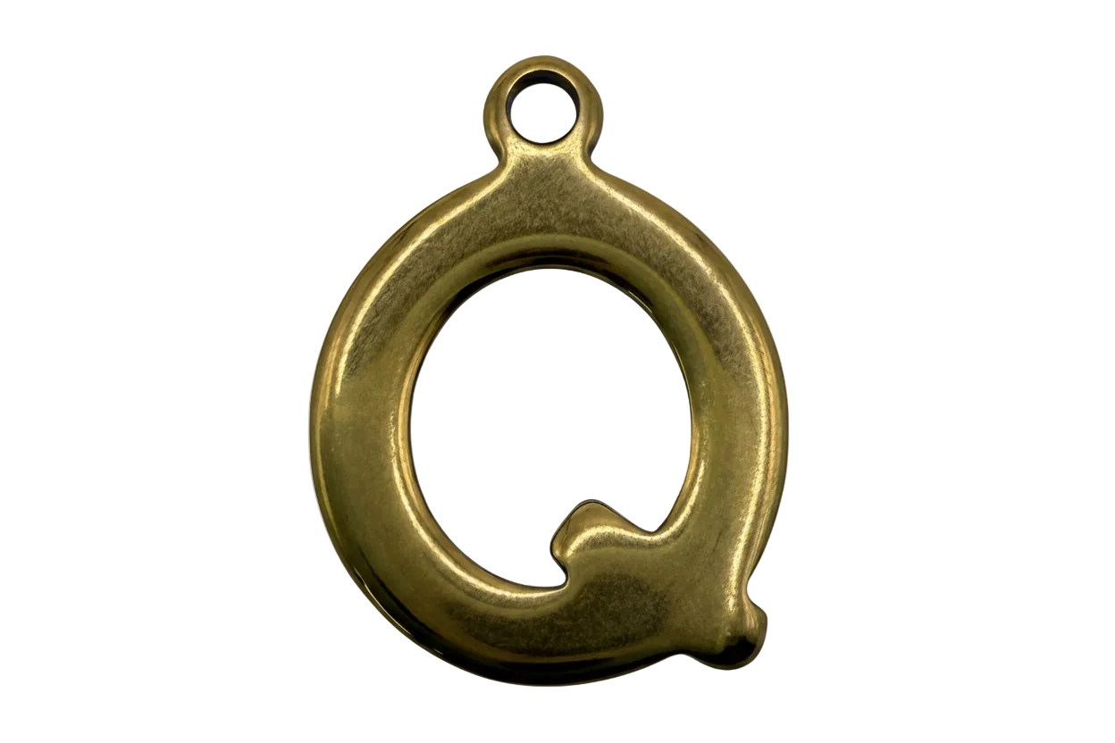 Polished gold initial Q with a rounded, sculpted profile