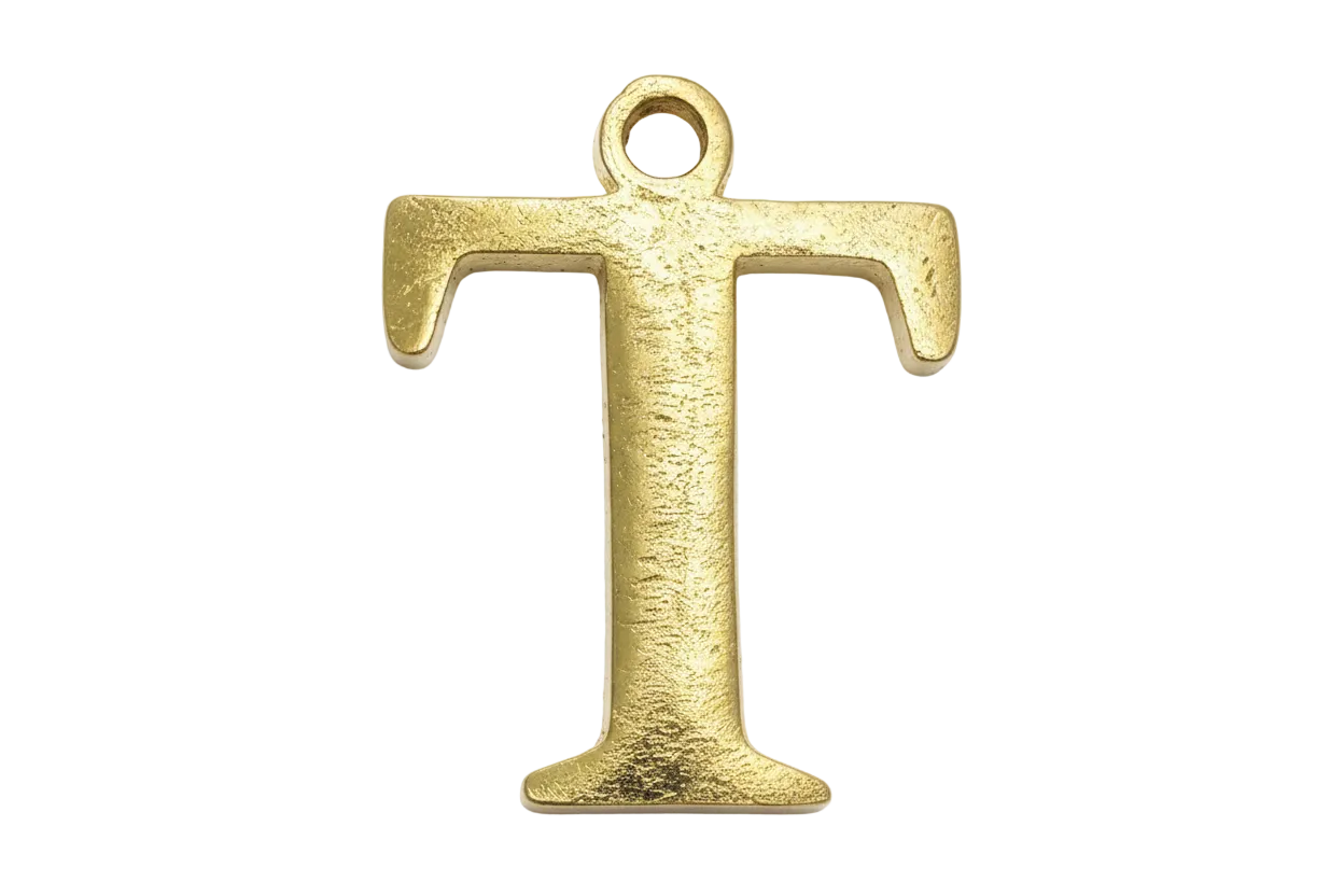 Textured gold letter T with brushed finish on black background