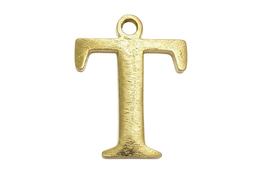 Textured gold letter T with brushed finish on black background