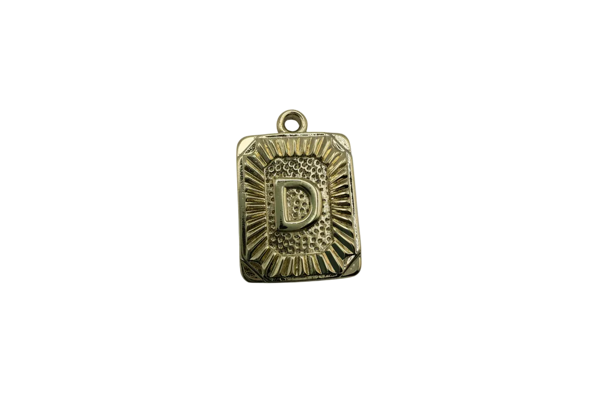 Gold letter D plaque with sunburst texture