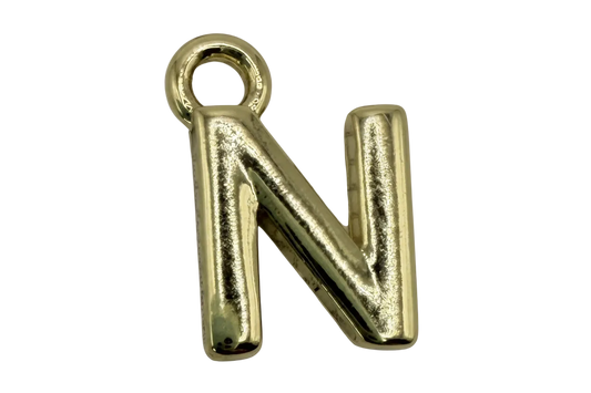 Polished gold letter N charm with rounded, puffed silhouette