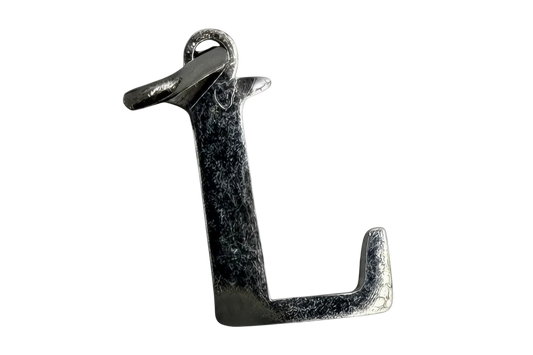 Polished silver letter L initial with a subtly textured finish