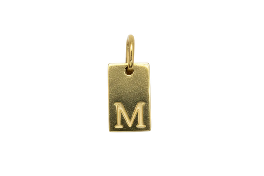Gold rectangular initial tag with raised letter M