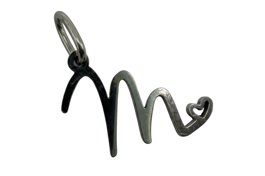 Polished silver script M initial charm with small open heart detail