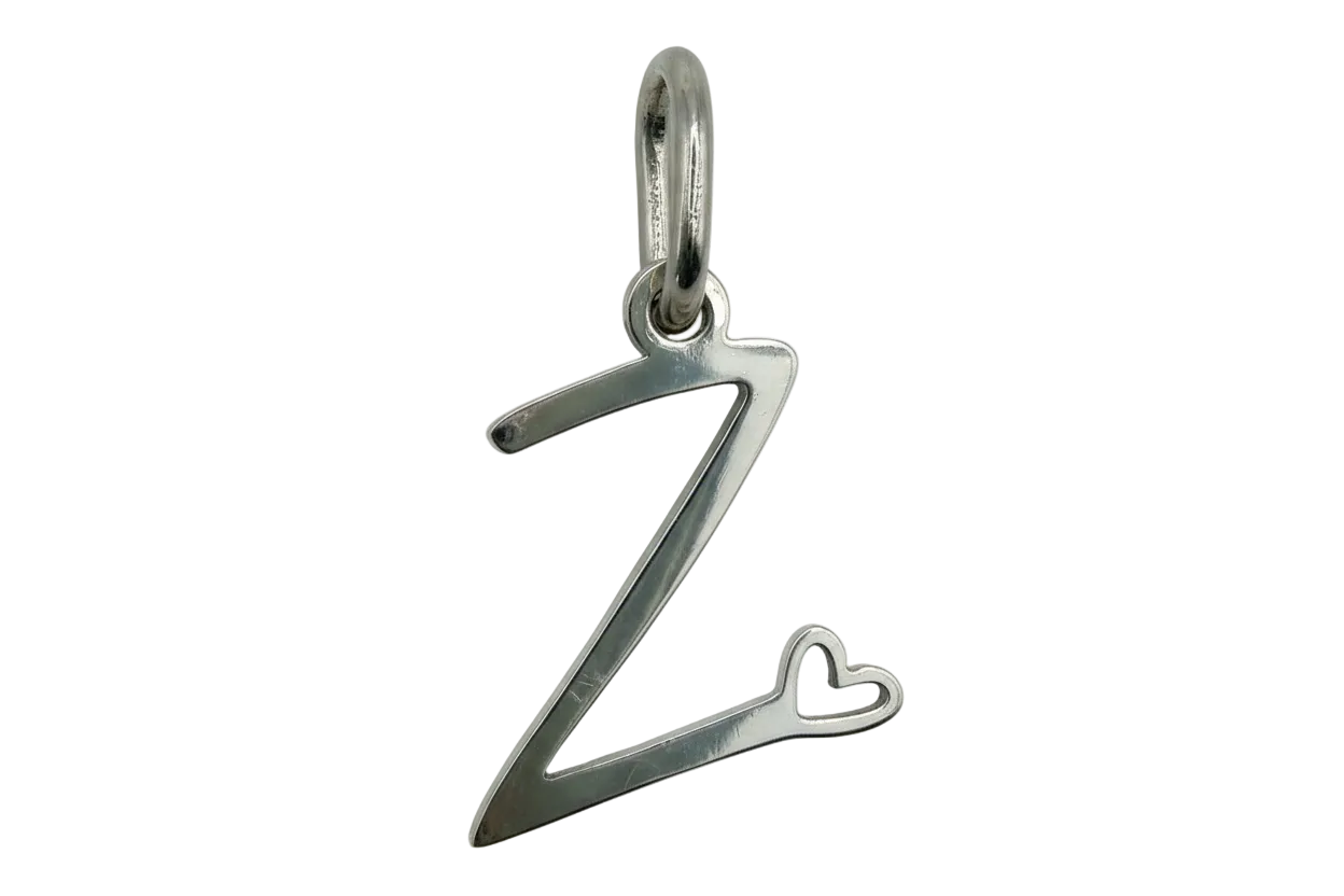 Polished silver letter Z charm with a small heart detail at the lower right