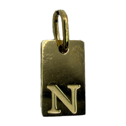 Polished gold rectangular tag with letter N detail