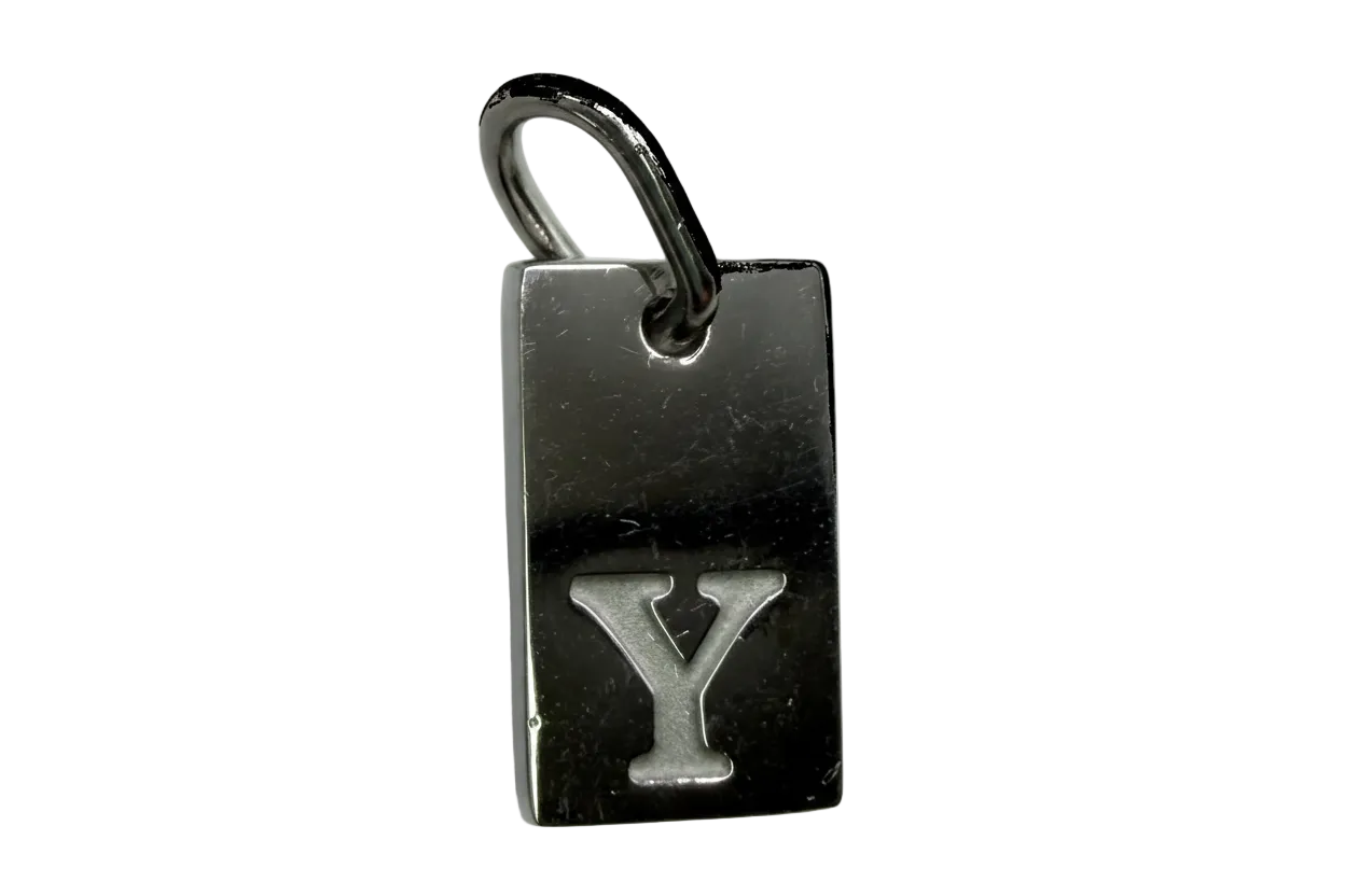 Polished silver-tone rectangular initial tag with raised letter Y