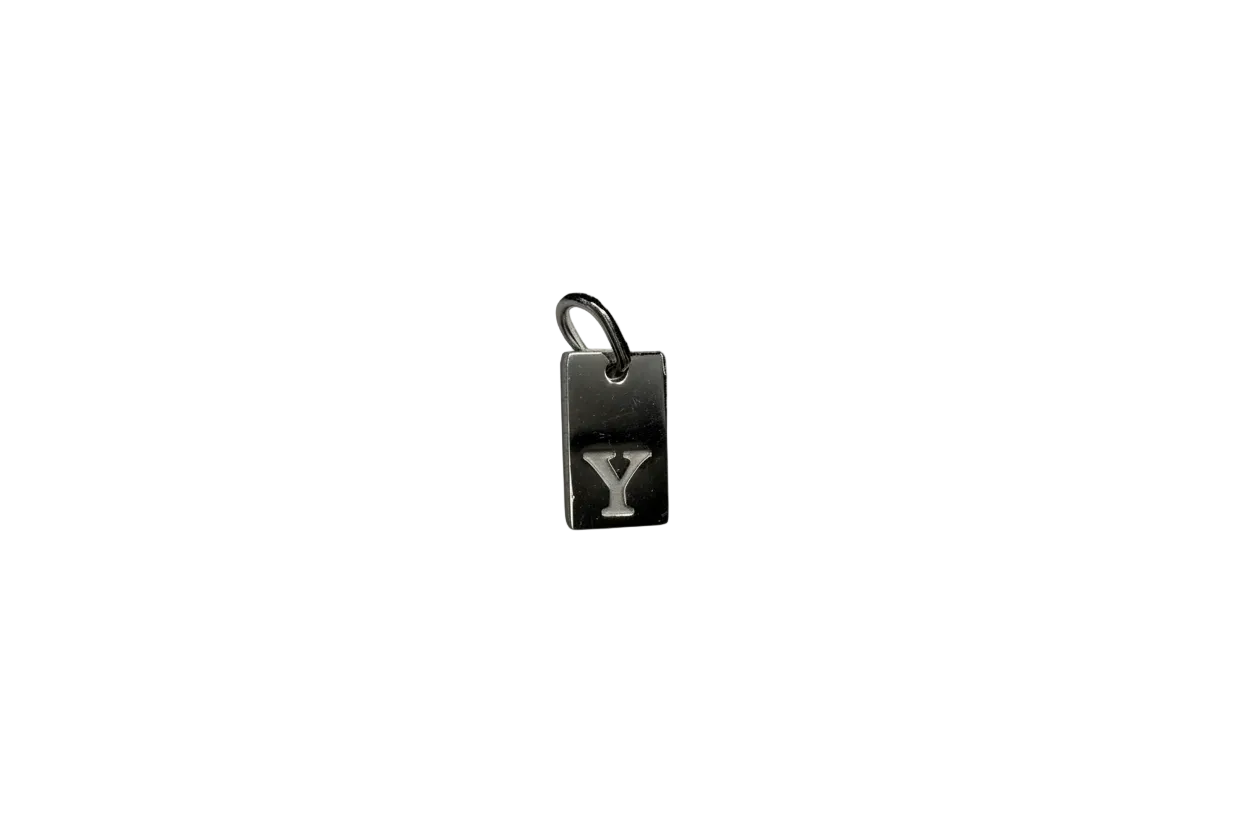 Silver-tone rectangular tag with raised Y initial